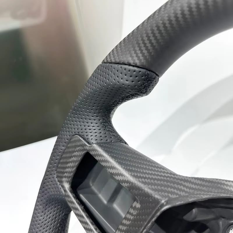 Volante Land Rover Defender 2020+ Fibra de Carbono/Cuero perforado