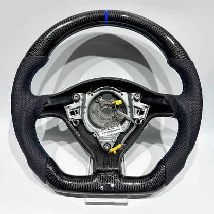 Volante Golf MK4 Fibra de Carbono/Cuero Perforado