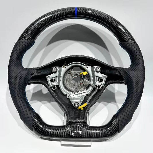 Volante Golf MK4 Fibra de Carbono/Cuero Perforado