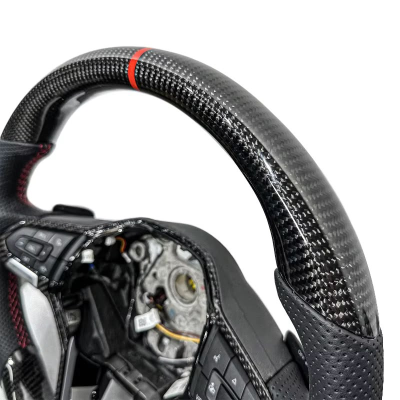 Volante VW 2020+ Fibra de Carbono/Cuero Perforado