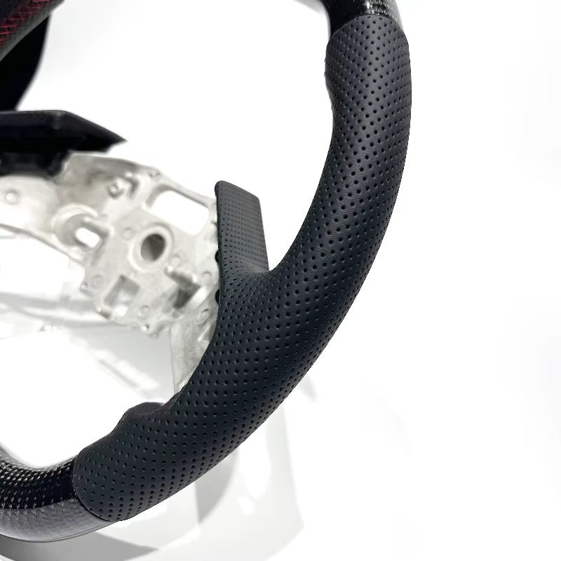 Volante Corvette C8 Fibra de Carbono/Cuero Perforado