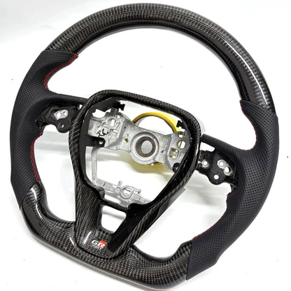Volante Corolla/Camry/Rav4 2019-2025 Fibra de Carbono
