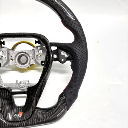 Volante Corolla/Camry/Rav4 2019-2025 Fibra de Carbono