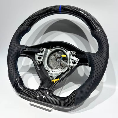 Volante Golf MK4 Fibra de Carbono/Cuero Perforado