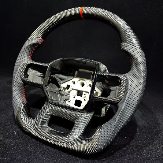 Volante F150/Lobo/Raptor/SuperSnake 2020+ Fibra de carbono/Cuero perforado