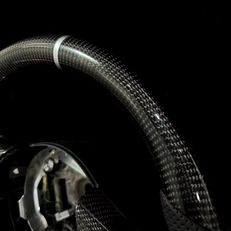 Volante Nissan 350X/Infiniti G35 Fibra de carbono/Cuero Perforado