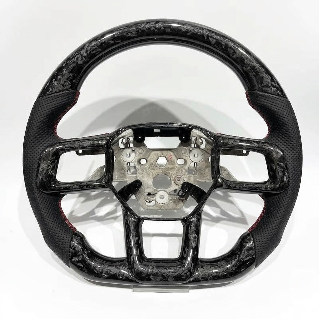 Volante Mustang S650 2024+ Fibra de carbono forjada/Cuero perforado