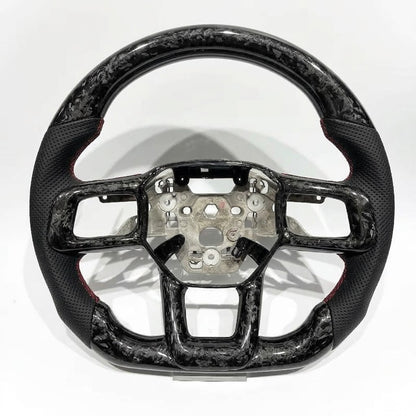 Volante Mustang S650 2024+ Fibra de carbono forjada/Cuero perforado