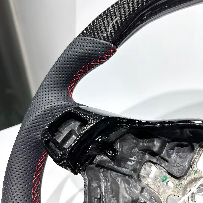 Volante GTI/GLI MK6 Fibra de Carbono/Cuero Perforado