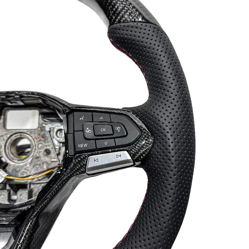 Volante VW 2020+ Fibra de Carbono/Cuero Perforado