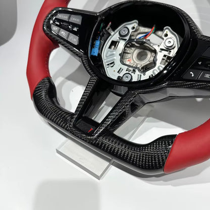 Volante BMW G20/G30/G80 2019-2026 Fibra de Carbono/Cuero Rojo