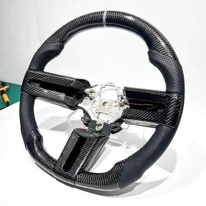 Volante Mustang 2007-2014 fibra de carbono/cuero perforado
