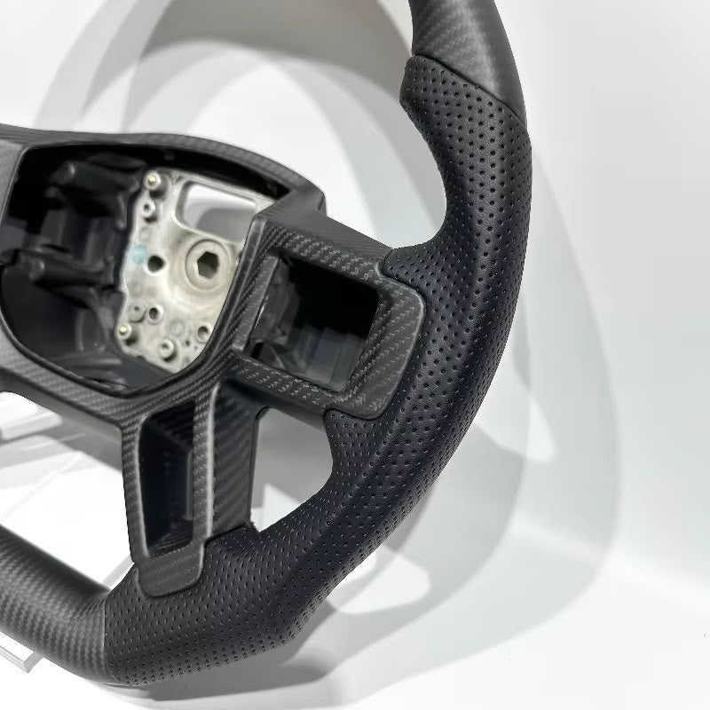 Volante Land Rover Defender 2020+ Fibra de Carbono/Cuero perforado