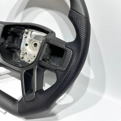Volante Land Rover Defender 2020+ Fibra de Carbono/Cuero perforado