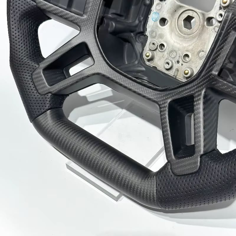 Volante Land Rover Defender 2020+ Fibra de Carbono/Cuero perforado