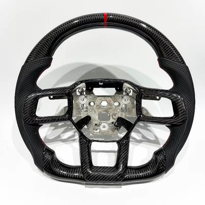 Volante Mustang S650 2024+ Fibra de carbono/Cuero perforado