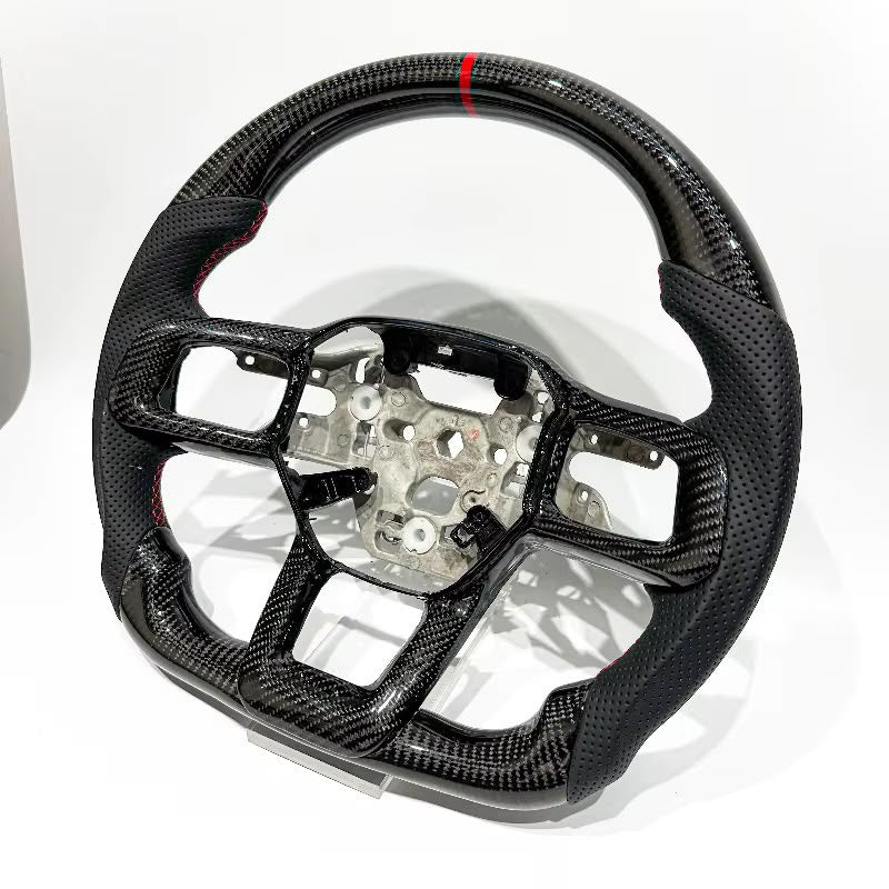 Volante Mustang S650 2024+ Fibra de carbono/Cuero perforado