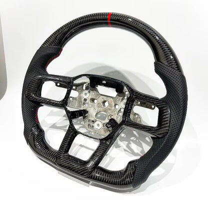 Volante Mustang S650 2024+ Fibra de carbono/Cuero perforado